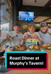 A trio of creators visit Murphy's Tavern in Crosby to review their Sunday roast. The video features close-ups of the roast dinner, including lamb, beef, and chicken, as well as cauliflower cheese and dessert. They also showcase the venue's atmosphere, live music, and branded Guinness pints, providing an enthusiastic and positive review.
