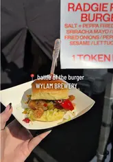 A fast-paced vlog-style reel documenting a visit to the 'Battle of the Burger' event at Wylam Brewery. The creator highlights several food vendors, showcasing their signature dishes including smash burgers, Detroit-style pizza, and unique dessert items. The video provides a quick tour of the event atmosphere and gives viewers a clear idea of what to expect.