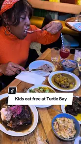 The creator visits Turtle Bay to highlight their 'kids eat free' offer. The video features a tour of the restaurant, shots of the food, the app interface for the offer, and the family enjoying the meal, including kids using activity sheets.
