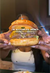 A short review video of a bottomless brunch at Temper, featuring close-ups of tacos, burgers, and cocktails, interspersed with shots of the restaurant's interior and the creator enjoying the meal.