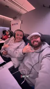 A couple reviews their Delta Premium Economy flight experience from Cancun to London via Atlanta, highlighting the 2-2-2 seat configuration and providing an honest critique of the in-flight meal service.