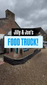 A creator reviews a spice box and truffle parmesan chips from Jilly & Joe's food truck, sharing his positive experience with the food quality and the venue's outdoor seating area.