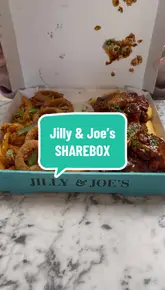 A short promotional video showcasing a new 'Deluxe Sharebox' from Jilly & Joe's food truck. The video features shots of the truck, the outdoor seating area, and a close-up reveal of the food platter, which includes wings, ribs, onion rings, and chips.