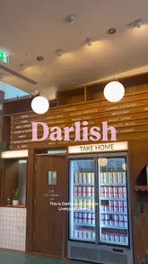 A short, upbeat video featuring two creators visiting Darlish Ice Cream in London. The video showcases the shop's interior, the variety of ice cream flavors available, and the creators enjoying their scoops, highlighting the Persian-inspired botanical and aromatic flavor profiles.