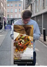 A review of Street Frites in Dublin, featuring the creator trying loaded fries and truffle fries. The video includes shots of the food, the kitchen preparation, and the creator's reaction to the taste and price.