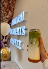 A short, energetic video documenting a visit to the newly opened Chocoberry in Milton Keynes. The video features a tour of the interior, shots of various drinks and food items, and the creator's reactions, highlighting the venue's aesthetic and menu offerings.