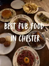 Cheeseburger and blackcurrant bakewell tart served at The Jolly Gardeners pub in Chester.