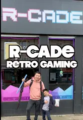 A creator visits R-Cade in Glasgow, a retro console arcade and cafe. The video highlights the variety of vintage gaming consoles available, the board game selection, and the casual cafe menu, including toasties and nostalgic snacks.
