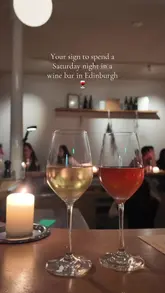 A short, atmospheric montage showcasing the interior and vibe of a wine bar in Edinburgh, featuring shots of wine glasses and the venue's decor.