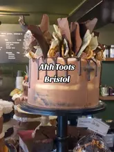A short, personal vlog-style video showcasing the indulgent cakes and dessert cups at Ahh Toots bakery in Bristol.