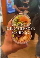 A promotional video for the opening of a new Sushidog location at Westfield Stratford, featuring shots of the sushi rolls, the venue signage, and a promotional activity involving keychain making.