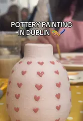 A vlog-style video showcasing a visit to a pottery painting studio in Dublin, explaining the process of choosing a piece, painting it, and the firing timeline.