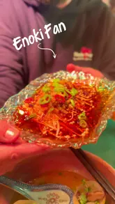A couple visits 'Big Fan' on Aungier Street to try their Chinese-style tapas. The video follows their experience from arrival to ordering, tasting various dishes, and providing an honest review of the food and value, concluding with a visit to a pizza place due to lingering hunger.