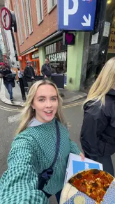 A fast-paced vlog-style reel documenting a 'Fat Saturday' food tour in London, visiting Breadstall Pizza for pizza slices, Blank Street for matcha, and Puffy for cookies.