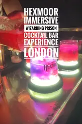 A short tour of a prison-themed immersive cocktail bar in London, featuring actors, hidden entrances, and themed drinks.
