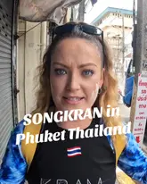 A first-person vlog capturing the Songkran festival in Phuket, Thailand, featuring the creators riding on a truck and participating in a city-wide water fight.