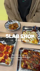 A short, energetic reel showcasing a visit to Slab Shop in Edinburgh. The video covers the exterior, the self-service kiosk ordering system, the seating area, and close-ups of various pizza slabs and chicken wings being enjoyed.