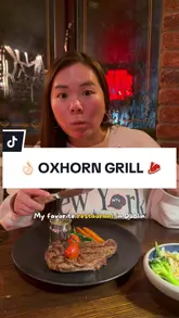 A review of Oxhorn Grill in Dublin, featuring a variety of dishes including steak, prawns, beef tartare, duck breast, and dessert, along with cocktails. The video highlights the restaurant's atmosphere and menu offerings.