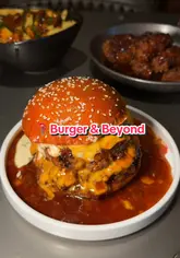 A food review video showcasing a variety of starters, burgers, and desserts at Burger & Beyond in London.