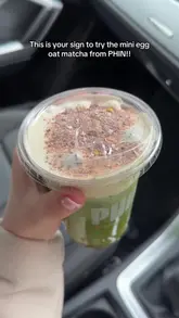 A short, enthusiastic review of a seasonal 'mini egg oat matcha' drink from a Vietnamese coffee shop. The creator shows the menu, the drink, and gives a taste test reaction.