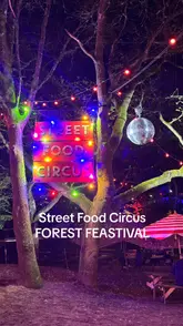 A fast-paced montage capturing a visit to the Forest Feastival street food event. The video highlights various food traders, including steak and cheesy mash, loaded fries, Sri Lankan lamb rolls, and desserts. It also showcases the festival's atmosphere, featuring outdoor seating in a wooded setting, cocktails, and live cabaret entertainment.