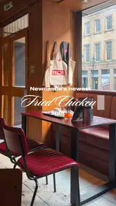A short, punchy video showcasing the new location of FEDS fried chicken in Newcastle, highlighting the interior, menu board, and food/drink offerings.