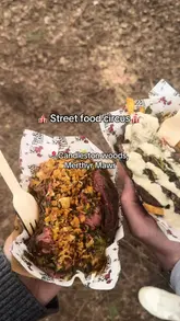 A vlog-style reel showcasing a visit to the Street Food Circus festival in Candleston Woods, featuring various food vendors, drinks, and the woodland atmosphere.