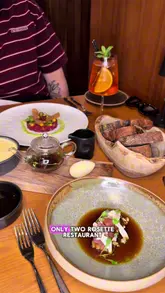 A review of the spring menu at Podium restaurant in Manchester, highlighting a 3-course set menu deal and showcasing various dishes including cheese custard, steak, and skewers.
