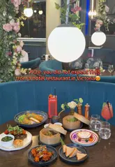 A short, aesthetic video showcasing the interior and food offerings at The Soak, a restaurant located within the Clermont Hotel in Victoria, London. The video features close-ups of dim sum, steak, and cocktails, highlighting the floral decor and elegant setting.