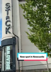 A short, energetic promotional video showcasing the opening of Breadwin, a new sandwich shop in Newcastle, highlighting their menu items like sandwiches, iced coffee, and donuts, alongside the venue's interior branding.