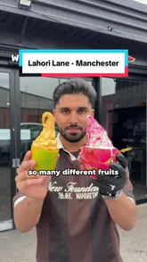 A short, energetic video showcasing the 'Whippy Fruit Bowls' at Lahori Lane in Manchester. The creator demonstrates the process of filling hollowed-out fruits like pineapple, mango, and dragon fruit with soft-serve ice cream, highlighting the unique presentation and variety of flavors available.