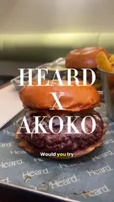 A review of a limited-time burger collaboration between Heard and Akoko, featuring West African-inspired flavors. The video showcases the burgers, sides, and dessert, providing a clear look at the menu items and the restaurant's atmosphere.