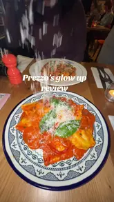 Here are a few options for your SEO alt text (all under 125 characters):

**Option 1 (Descriptive & SEO-focused):**
A delicious meal of fresh Italian pasta and pizza served at the modern Prezzo restaurant in Chelmsford, Essex.

**Option 2 (Action-oriented):**
Close-up of a food blogger enjoying an authentic Italian dining experience at the newly renovated Prezzo in Chelmsford.

**Option 3 (Concise):**
Table setting featuring a variety of Italian pasta dishes and pizza during a food review at Prezzo in Chelmsford.

**Best practice tip:** Ensure you choose the one that most closely matches exactly what is visible in the photo!