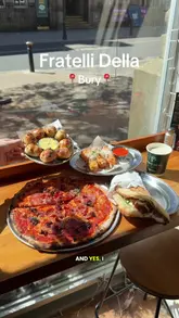 A fast-paced, enthusiastic review of Fratelli Della in Bury, featuring a variety of menu items including pizza with ranch dip, mozzarella sticks, and a unique pizza sandwich. The creator highlights the food's quality and the venue's atmosphere.