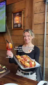 The video features a creator visiting 'Head of Steam' to showcase their new Detroit-style pizza menu, 2-4-1 cocktails, and various small plates. It also highlights the venue's entertainment offerings, including magnetic darts and shuffleboard, providing a comprehensive look at the pub's atmosphere and amenities.