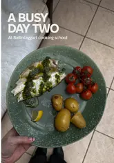 A vlog-style video documenting day two of a three-day cooking course at a school in Scotland, showing the preparation of bread, sea bass, and posset.