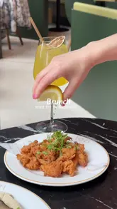 A short, aesthetic montage showcasing a brunch experience at Tozi in Battersea, featuring close-ups of egg dishes, burrata, cocktails, and coffee in a stylish, modern setting.