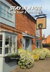 The video is a review of a stay at The Pointer in Brill, Buckinghamshire. It features a tour of the superior room, highlights the countryside setting, and reviews the breakfast, specifically the smashed avocado and the bacon breakfast bun.