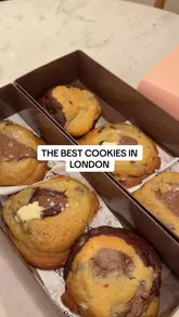 A fast-paced listicle video counting down the creator's top 10 cookie spots in London. The video features a variety of cookie styles, from stuffed cookies to cookie dough and skillet desserts, filmed at various locations including market stalls and dedicated bakeries.