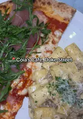 A personal review of Coia's Cafe in Glasgow, highlighting the extensive menu, family-friendly atmosphere, and specific dishes like pizza, pasta, and homemade ice cream.