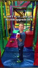 A fast-paced, energetic video showcasing a new laser tag activity set within a soft play area at Woking Leisure Centre. The footage captures children running through tunnels, using the laser tag equipment, and playing in the ball pit, highlighting the immersive and competitive nature of the experience.