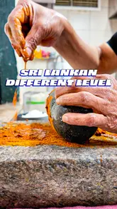 The video features a creator visiting Colombo Kitchen, a Sri Lankan restaurant in London. The creator interviews the chef, Sylvia, who explains her philosophy of using authentic, imported spices and traditional stone-grinding techniques. The video showcases the cooking process in the kitchen and the creator's reaction to the spicy food.