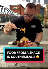 A creator visits Moonshine Shack in South Elmsall, reviewing their burger and fries. The video features the exterior of the venue and close-up shots of the food being eaten.