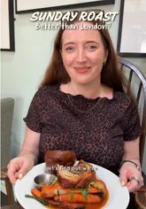 The creator visits The Pointer Brill, a pub with rooms in the countryside, to review their Sunday roast. The video features a tour of the venue, a look at the menu, and close-ups of the food, including a slow-cooked porchetta roast and fish and chips.