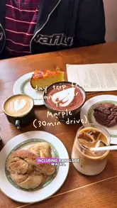 A vlog-style reel documenting a day trip from Manchester to Marple, featuring a canal walk, a visit to a cafe (Tawny Stores), and a meal at a restaurant (Libby's Bread and Wine). The video highlights the scenic canal, local wildlife, and the food and drink offerings at both venues.