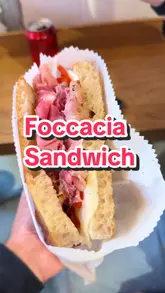 A group of friends visits Mootz in Glasgow to review their focaccia sandwiches. The video features close-ups of the food, the menu board, and the creators' genuine reactions to the sandwiches, providing a clear and appealing look at the venue's offerings.
