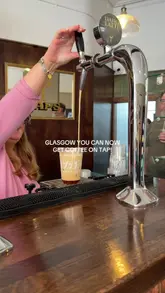 A short video showcasing a coffee shop in Glasgow that serves coffee on tap, demonstrating the pouring and topping process.