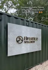 A short, vlog-style tour of the Fire & Ice Wellness site near Bristol, featuring a sauna, ice baths, and outdoor relaxation areas with scenic views.