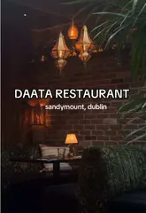 A review of Daata Restaurant in Sandymount, Dublin, showcasing the interior, menu, and various dishes including chicken tikka, lamb chops, chicken biryani, Afghani chicken, and a sizzling brownie dessert.