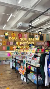 A couple spends a Saturday in Manchester, visiting The Pen and Pencil for brunch, shopping at Fred Aldous and Outsiders store, browsing plants at Nice Things, and ending with drinks at New Century. The video uses a vlog-style format with timestamps to guide the viewer through their day.